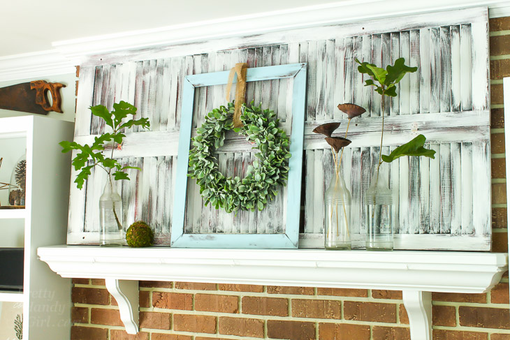 Old Shutters as backdrop on mantel