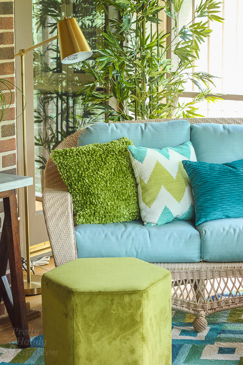 This Drab Screen Porch got a major Makeover with pops of Aqua and Green! Yummy Color!