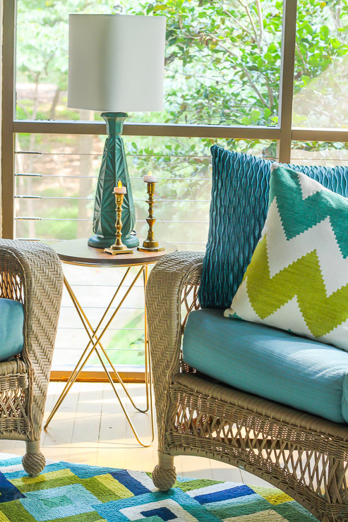 This Drab Screen Porch got a major Makeover with pops of Aqua and Green! Yummy Color!