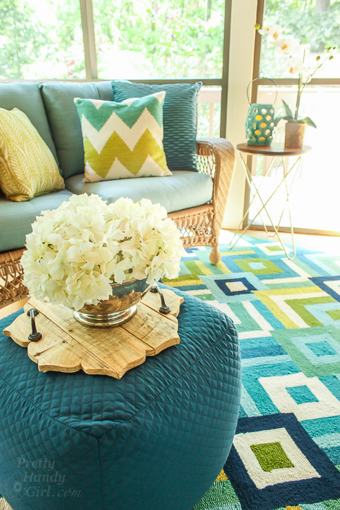 This Drab Screen Porch got a major Makeover with pops of Aqua and Green! Yummy Color!