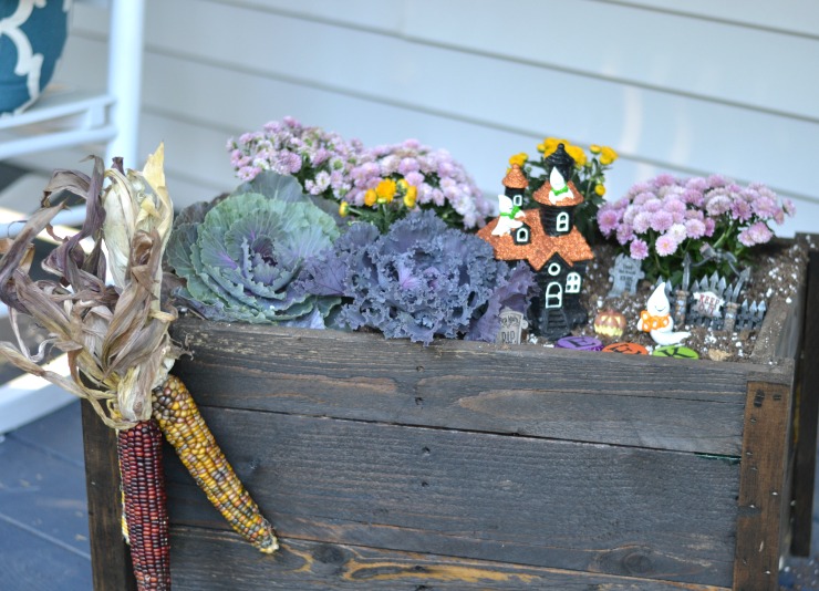 Add a fun Halloween Ghostly Garden to your fall planter. | PrettyHandyGirl.com