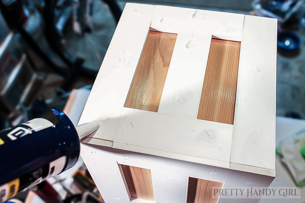 fill nail holes with exterior siding and trim caulk
