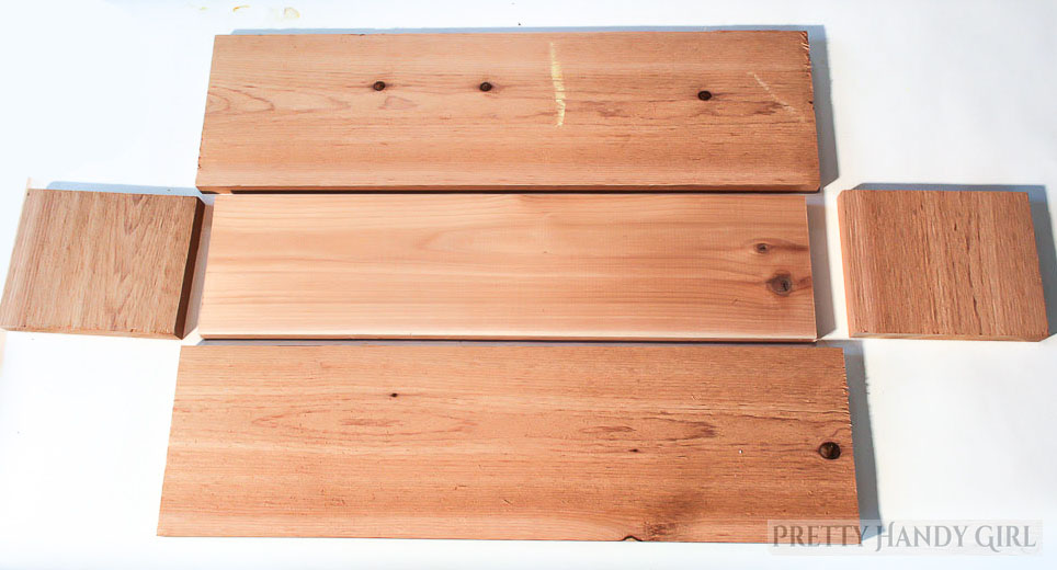 pieces of cedar board cut for window box construction