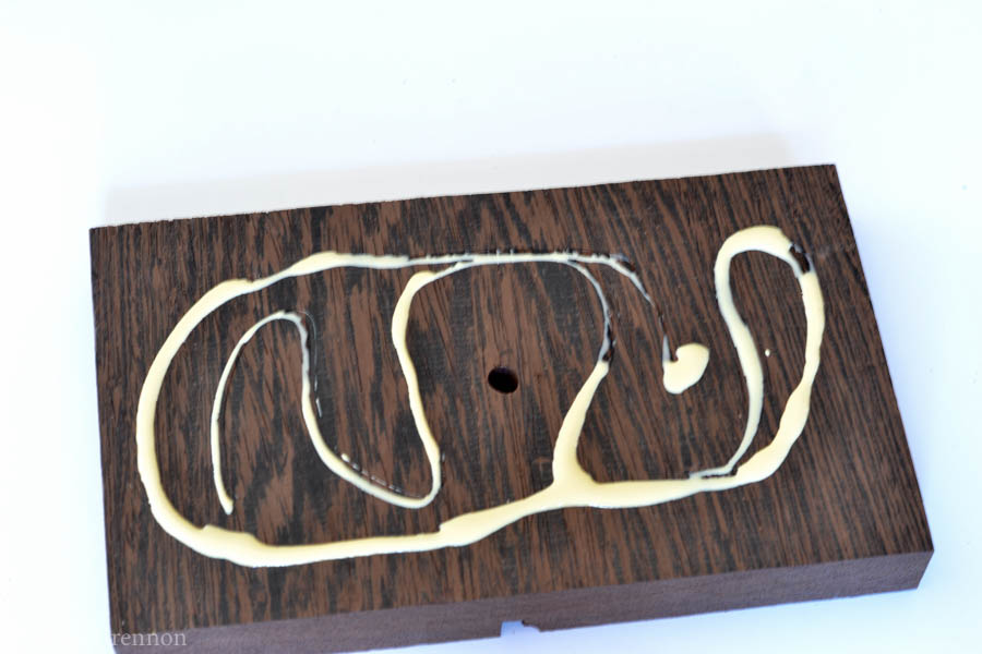 This DIY cell phone holder and charging station is a great last minute gift idea.