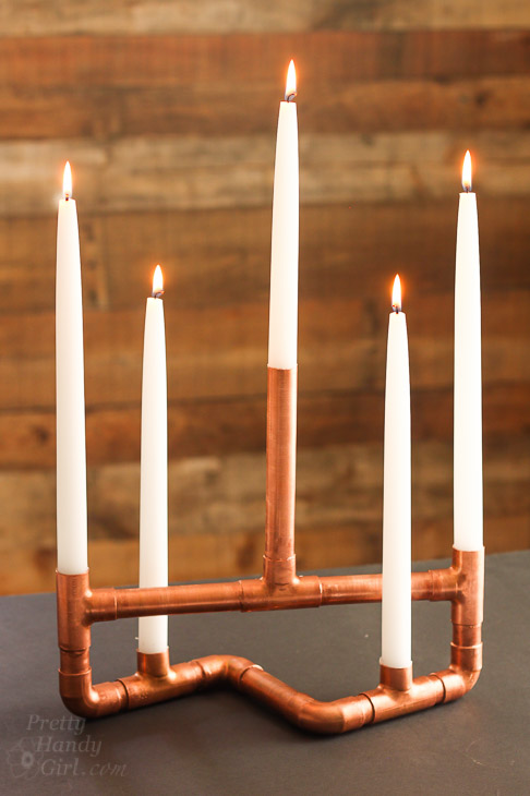 copper-pipe-centerpiece-candleabra-lit-2