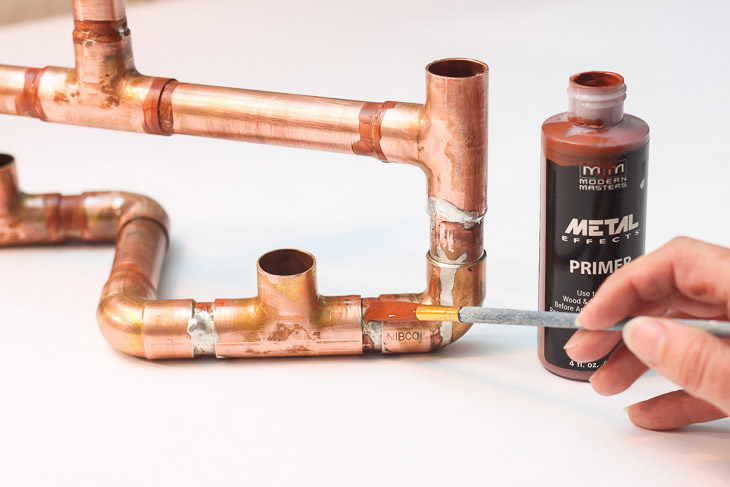 paint-metal-effects-primer-onto-solder-joints