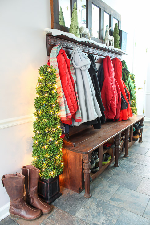 clever holiday decor - lighted topiaries inside
