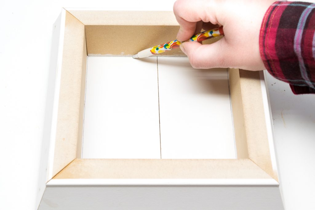 Mark the bottom of your candle lantern and cut to fit.