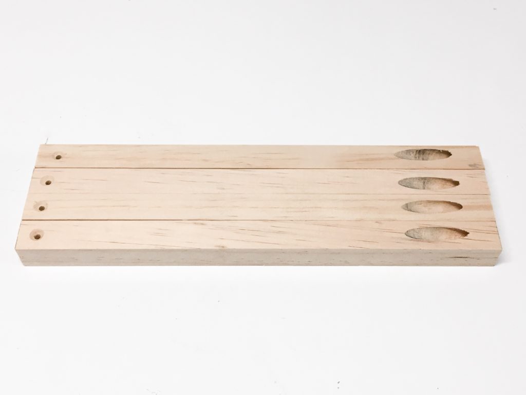 Predrill countersink holes and pocket holes in your dowels for the candle lantern supports.