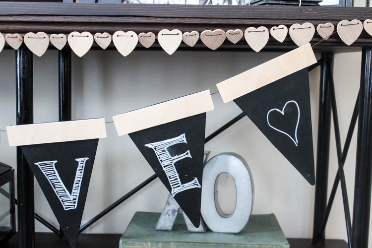 Love this twist on the traditional party banners! This rustic wooden version can be used again and again.