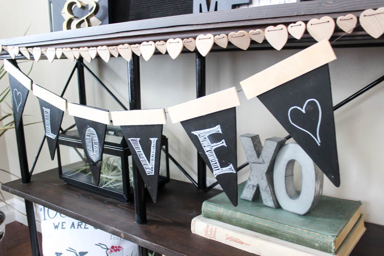 Love this twist on the traditional party banners! This rustic wooden version can be used again and again.