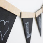 Love this twist on the traditional party banners! This rustic wooden version can be used again and again.