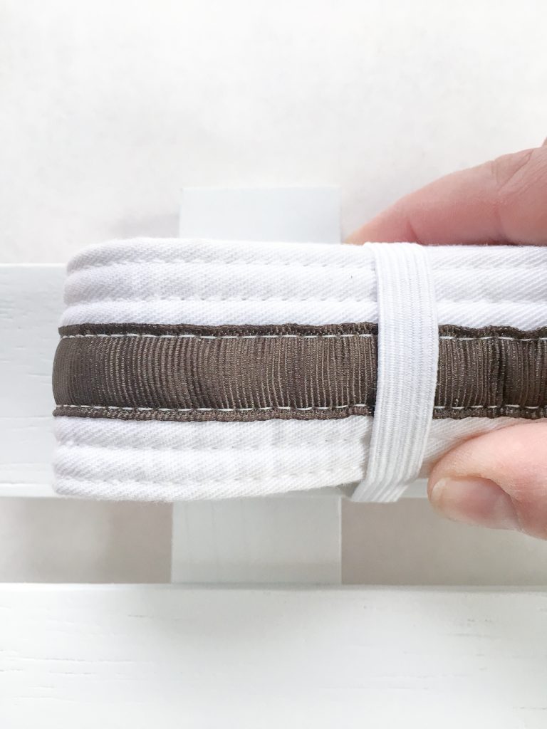 Measure the elastic to hold the belt in place.