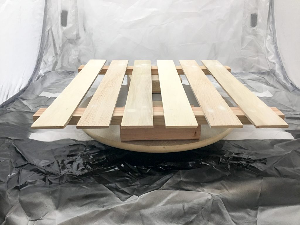 Use a tabletop spray shelter and a lazy susan to make spray painting easy!
