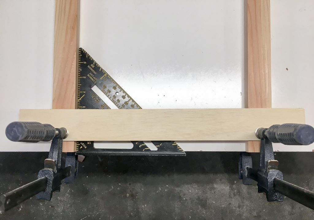 Clamp the first slat in place, making sure it's square.