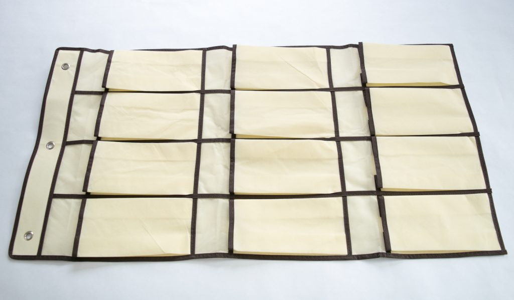 If there are more pockets than you have tools, trim off the bottom rows of your organizer.