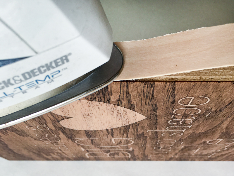 Iron on the edge banding to cover up the raw plywood edges of the teacher sign.