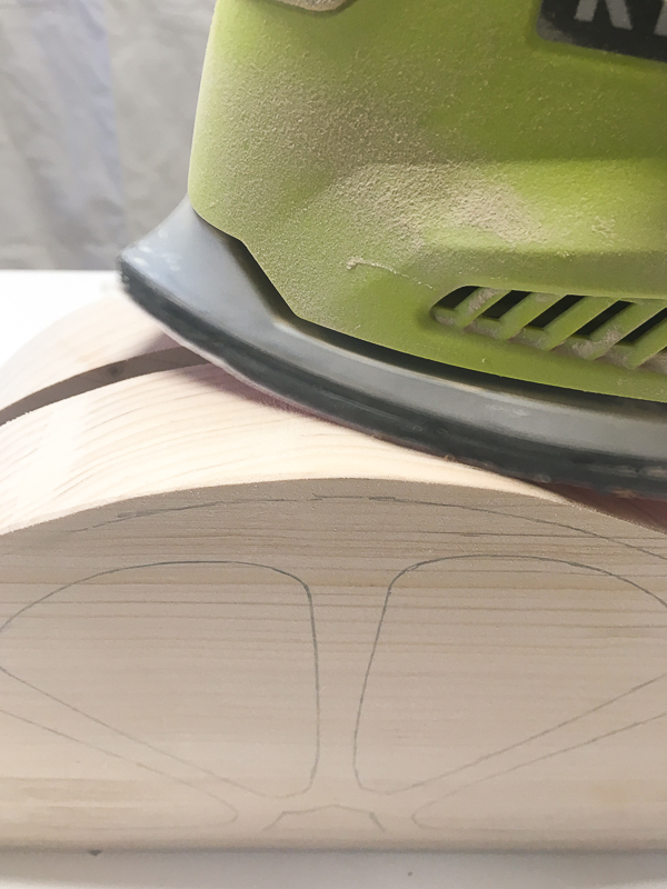 Sand the semicircles and round over the edges.