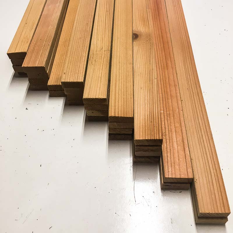 Cut the pieces for your fence trellis out of inexpensive fence pickets.