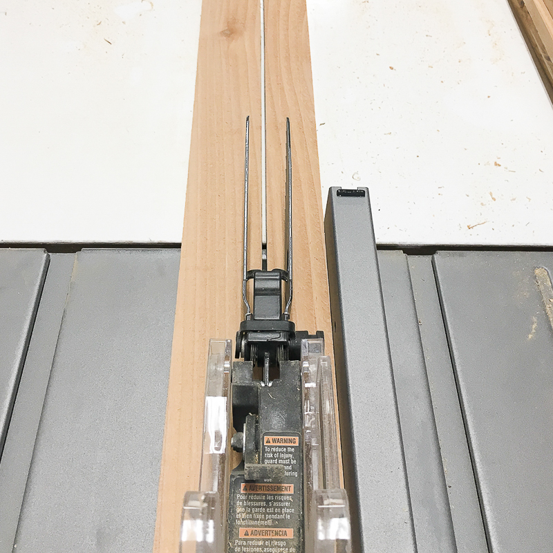 Cut cedar fence pickets into 1 1/2" strips to create this fence trellis.