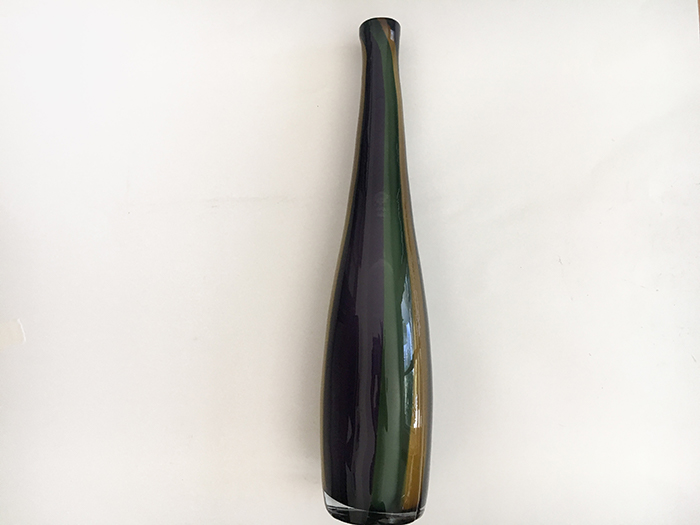 A quick and easy updated to an old glass vase using stone spray paint and clay flowers