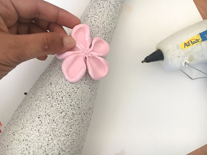 Recycled glass vase with stone spray paint and clay flowers
