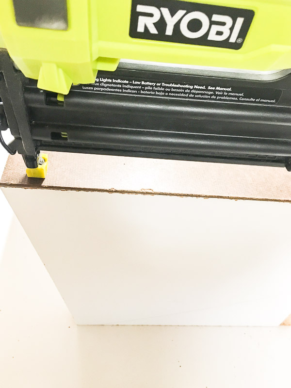 Attach the back to your cordless drill storage box with 1 1/2" brad nails.