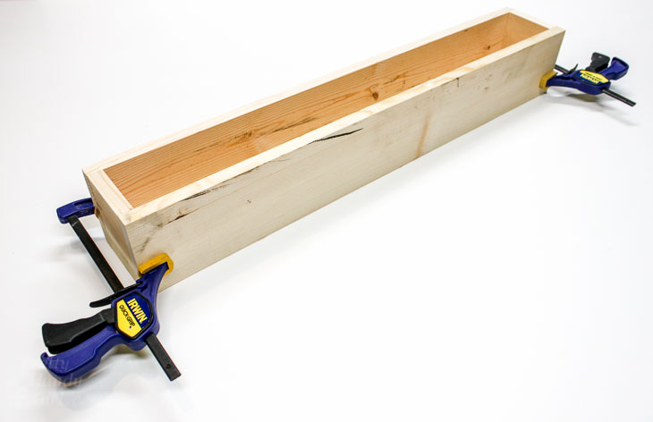 Clamp box pieces together.