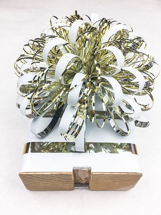 Decorate your stocking holders with a festive bow!