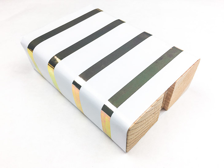 Finish wrapping your stocking holder block.