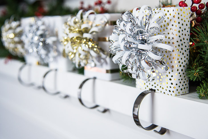 Love how festive these DIY stocking holders look on the mantel!