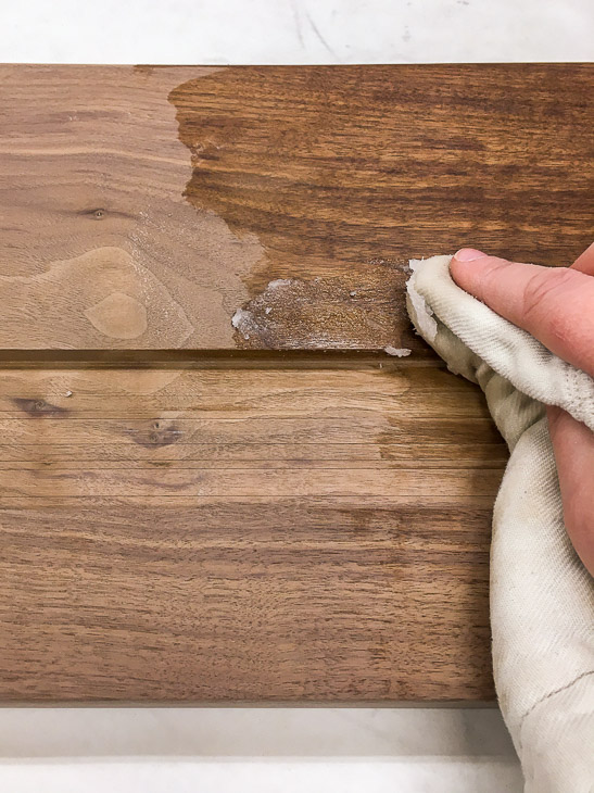 Add mineral oil or cutting board wax to the board before adding the marble inlay.