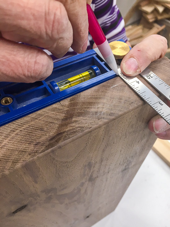 Mark the cut for the marble insert on the edge of the board.