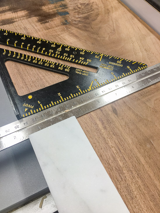 Cut the ends of your cheese board to the length of your marble piece.