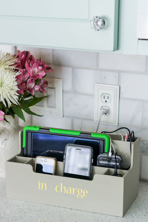 "In charge" Gray Charging Station on kitchen counter