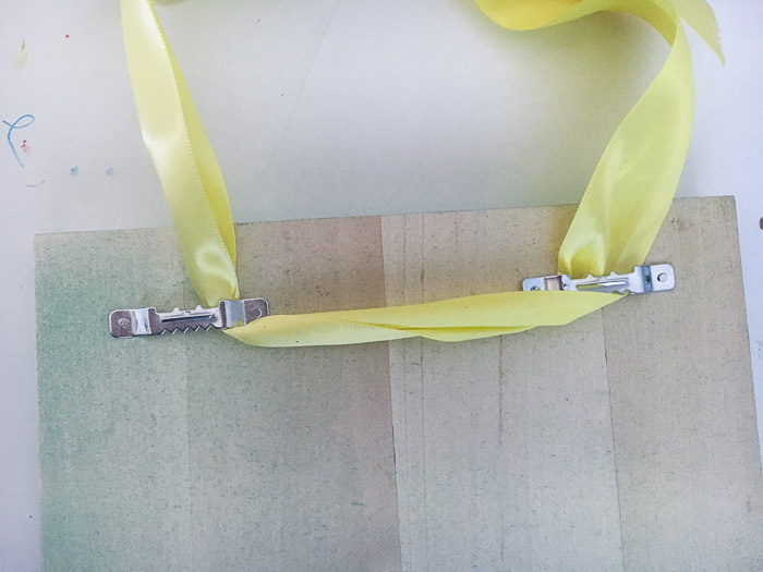 How to attach ribbon to a spring plaque