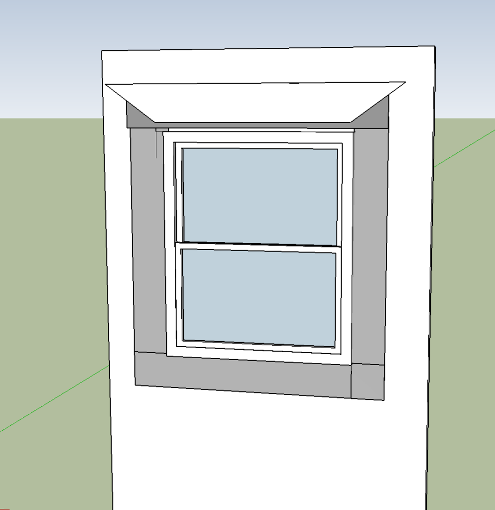 Flap of house wrap overlaps top of window flashing.
