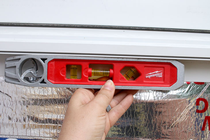 measure window level during new construction installation