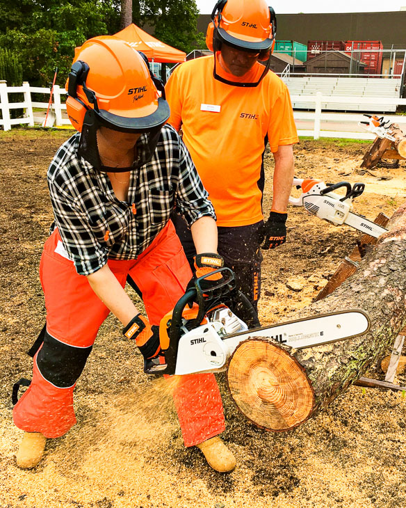 brittany trying chain saw