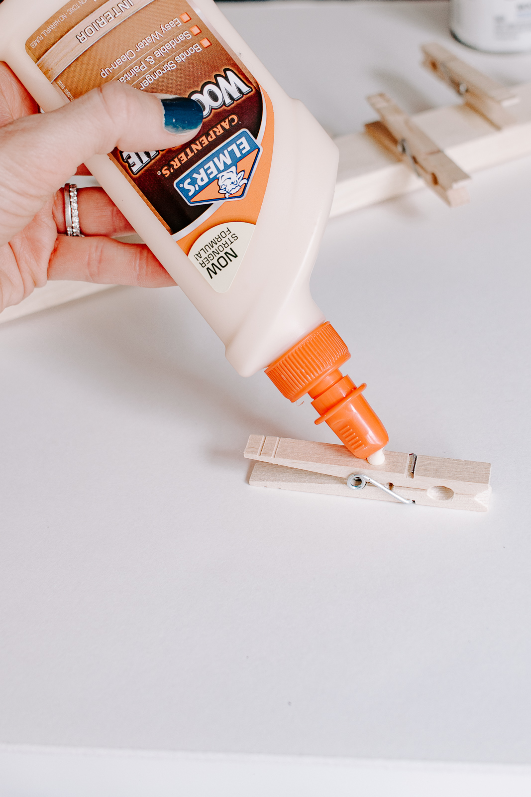 add glue to back of clothespins