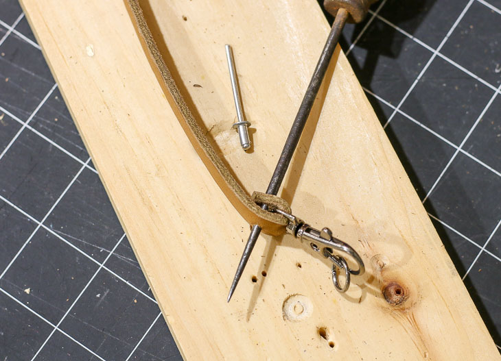 puncture second hole into leather band