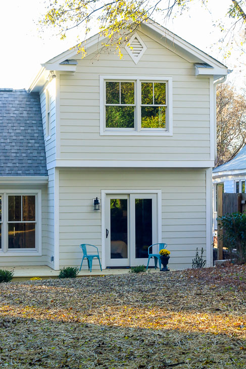 two story side of house backyard transformed