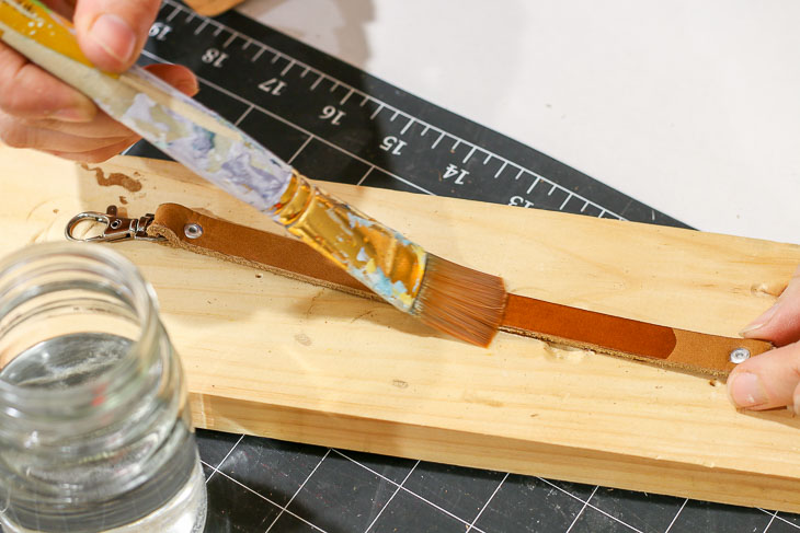 painting water onto leather band