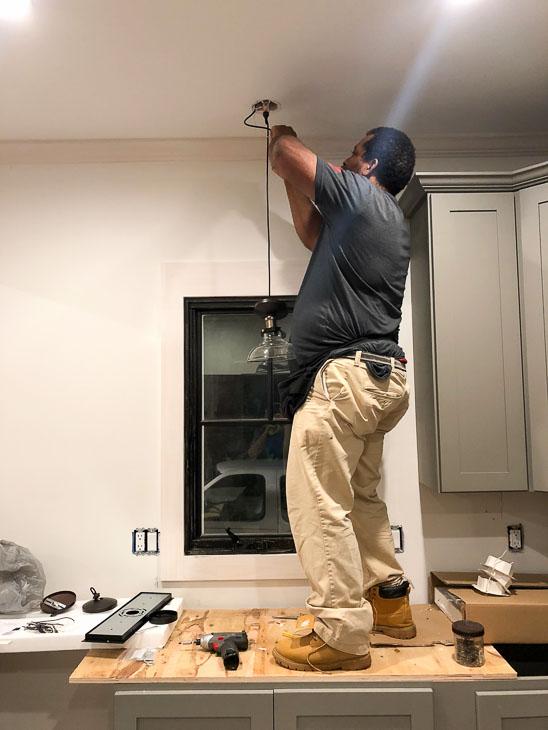 electrician hanging pendant light