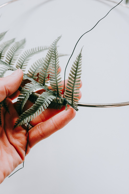Snip off a piece of Floral Wire and Use this to Wrap your greenery around Hoop