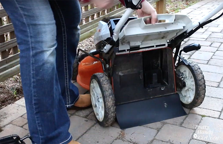 lifting back hatch on mower
