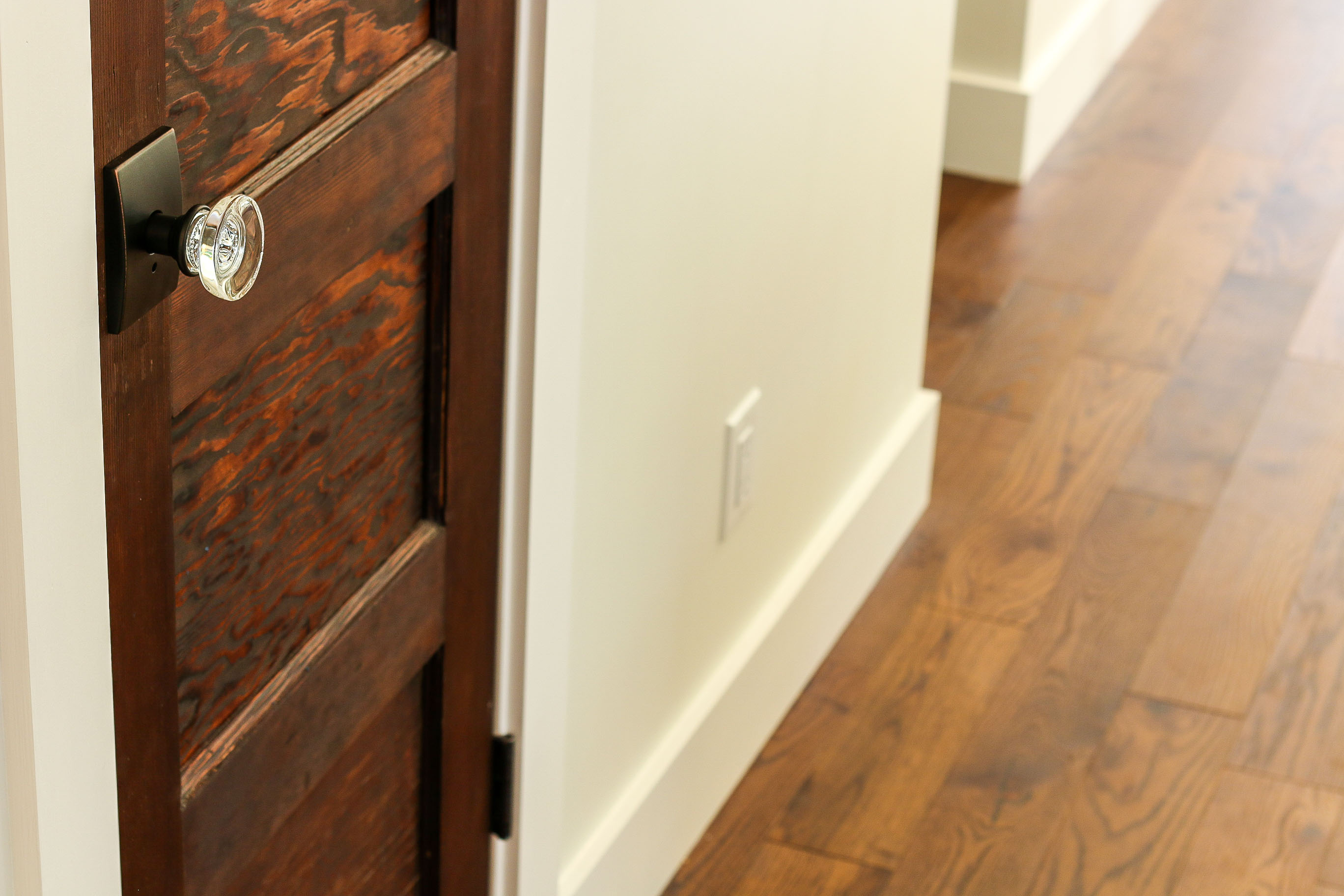 Reclaimed wood door with round glass door knob