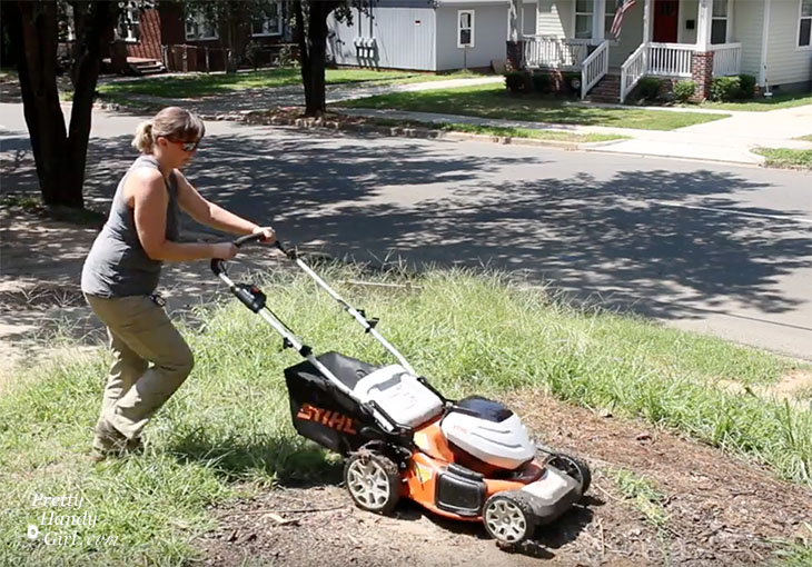 Brittany cutting thick lawn with STIHL RMA 460 mower