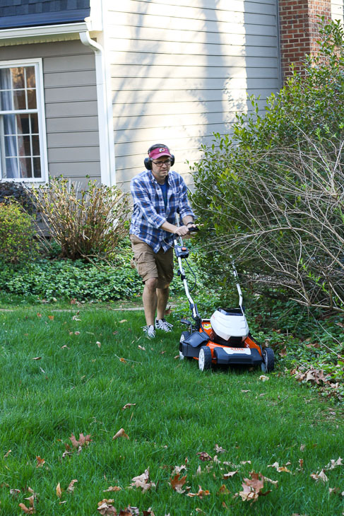 Pretty Handsome Guy mowing the lawn