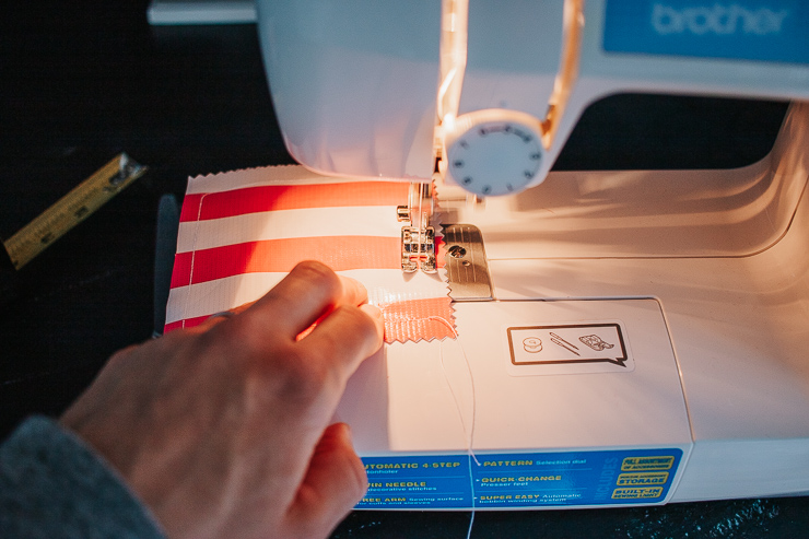 Gently feed oilcloth through your machine so it doesn't stick to the presser foot